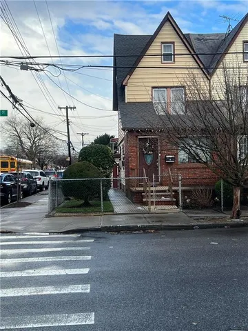 a view of a house with a street
