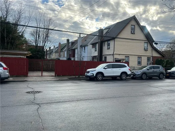 a car parked in front of a house