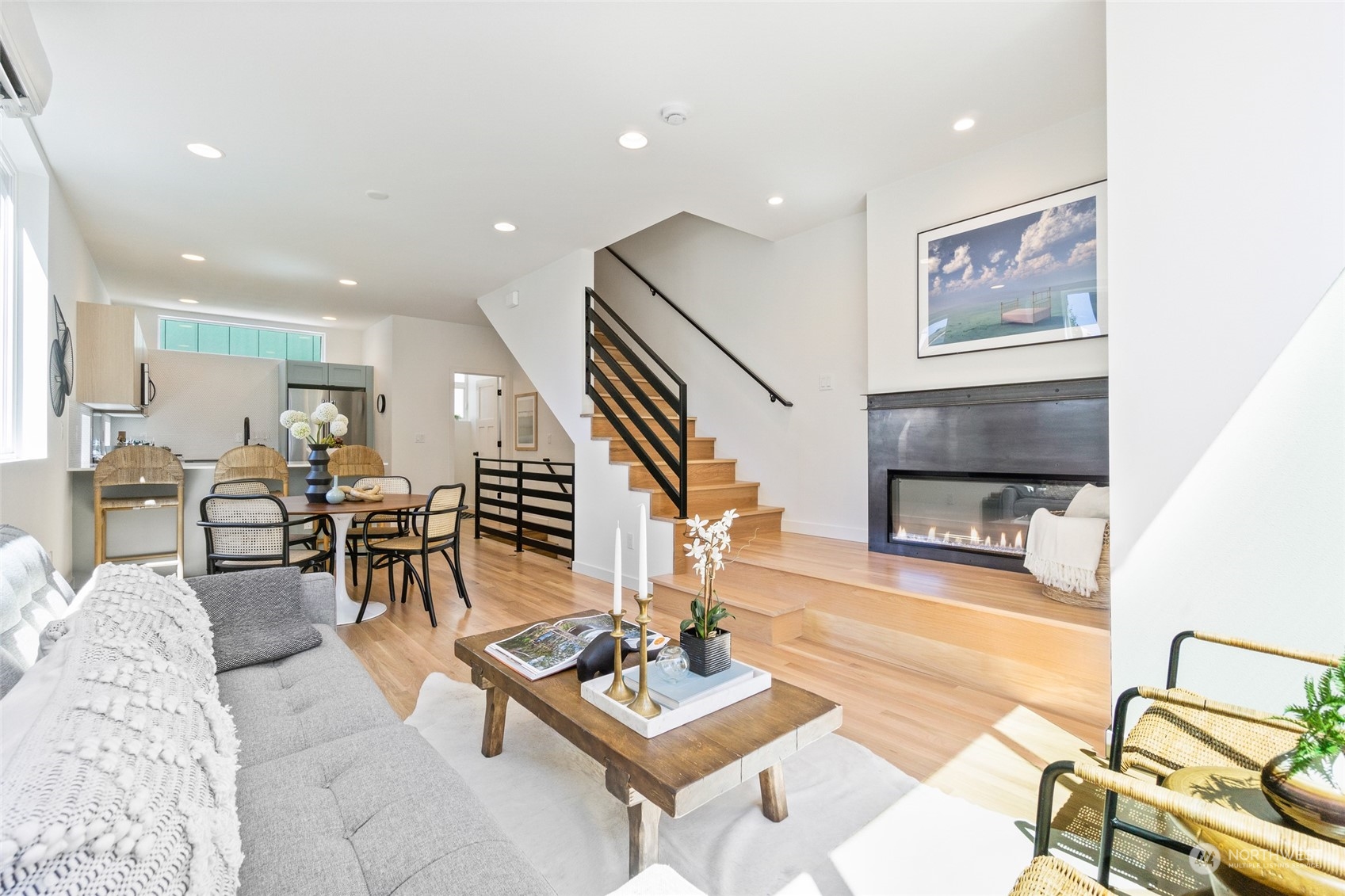 2620 Northwest 62nd Street, Unit B Seattle, WA 98107 - Photo 14 of 34 a living room with furniture and wooden floor