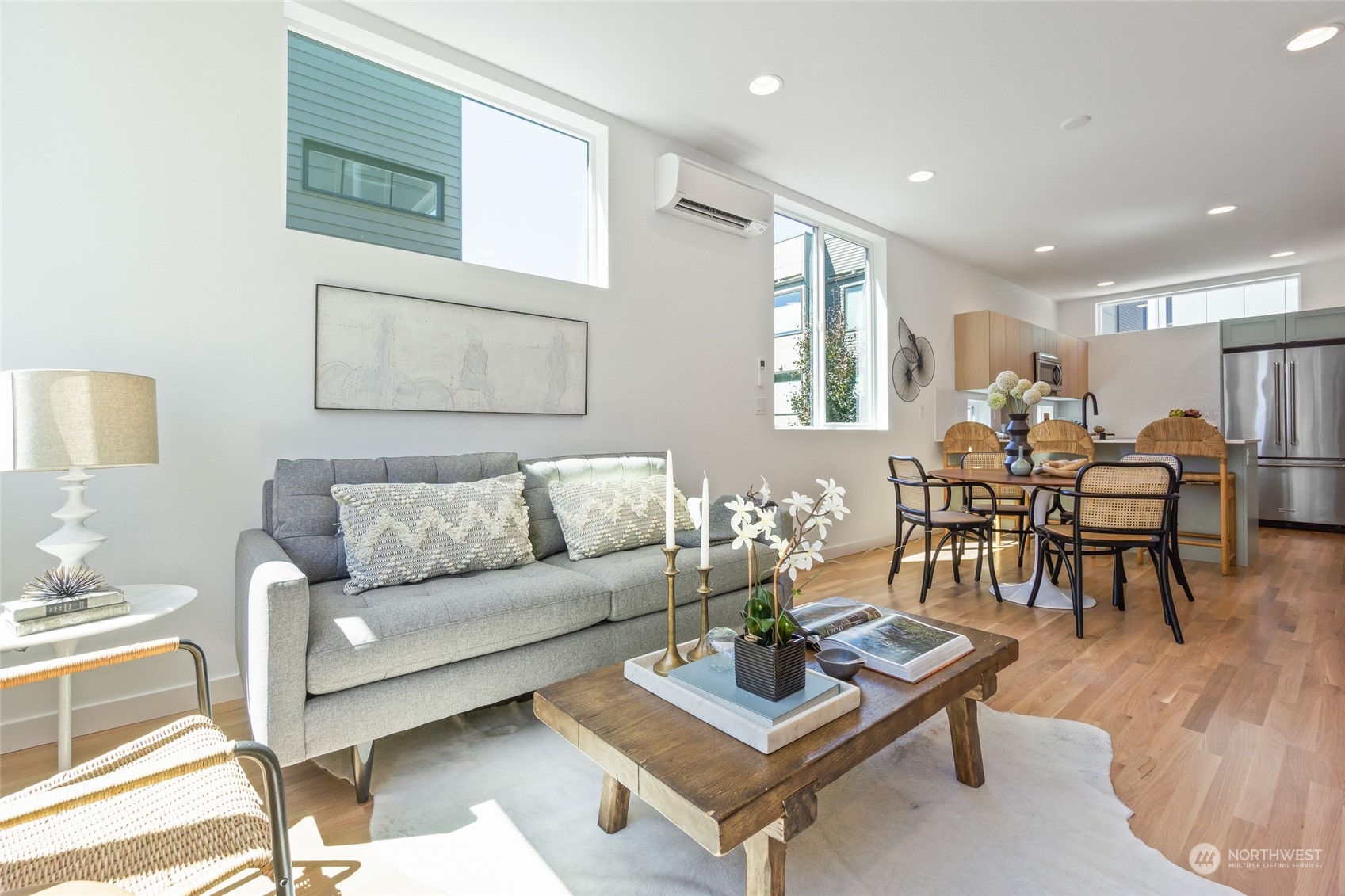 2620 Northwest 62nd Street, Unit B Seattle, WA 98107 - Photo 15 of 34 a living room with furniture and wooden floor