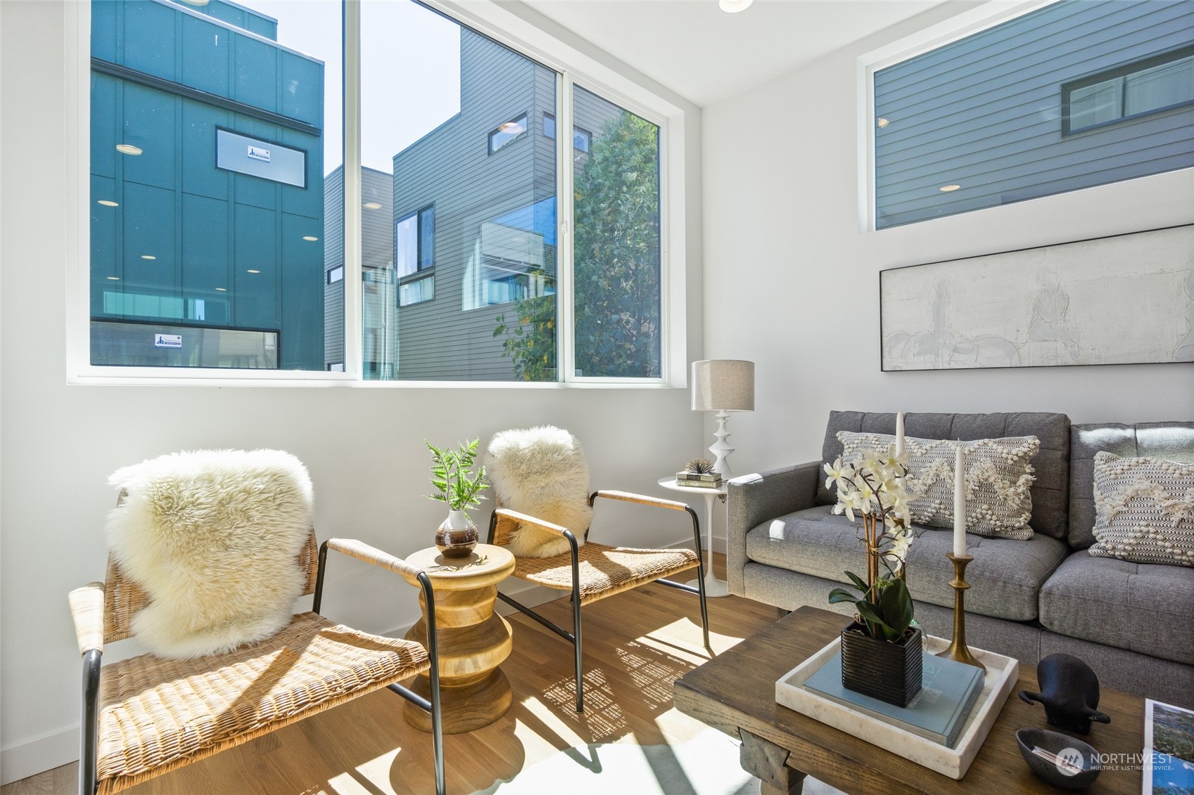 2620 Northwest 62nd Street, Unit B Seattle, WA 98107 - Photo 16 of 34 a living room with furniture and a potted plant
