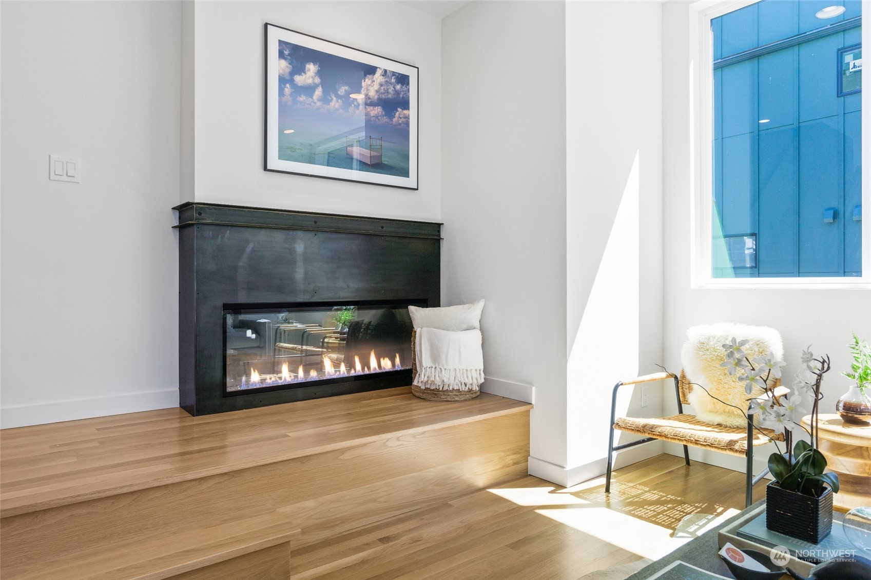 2620 Northwest 62nd Street, Unit B Seattle, WA 98107 - Photo 17 of 34 a living room with furniture and a fireplace