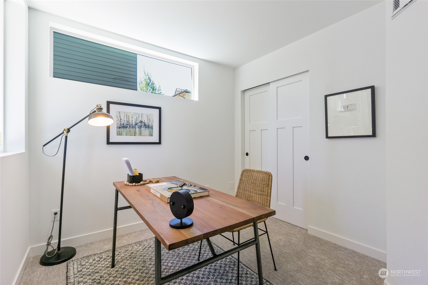 2620 Northwest 62nd Street, Unit B Seattle, WA 98107 - Photo 2 of 34 a view of a workspace with furniture