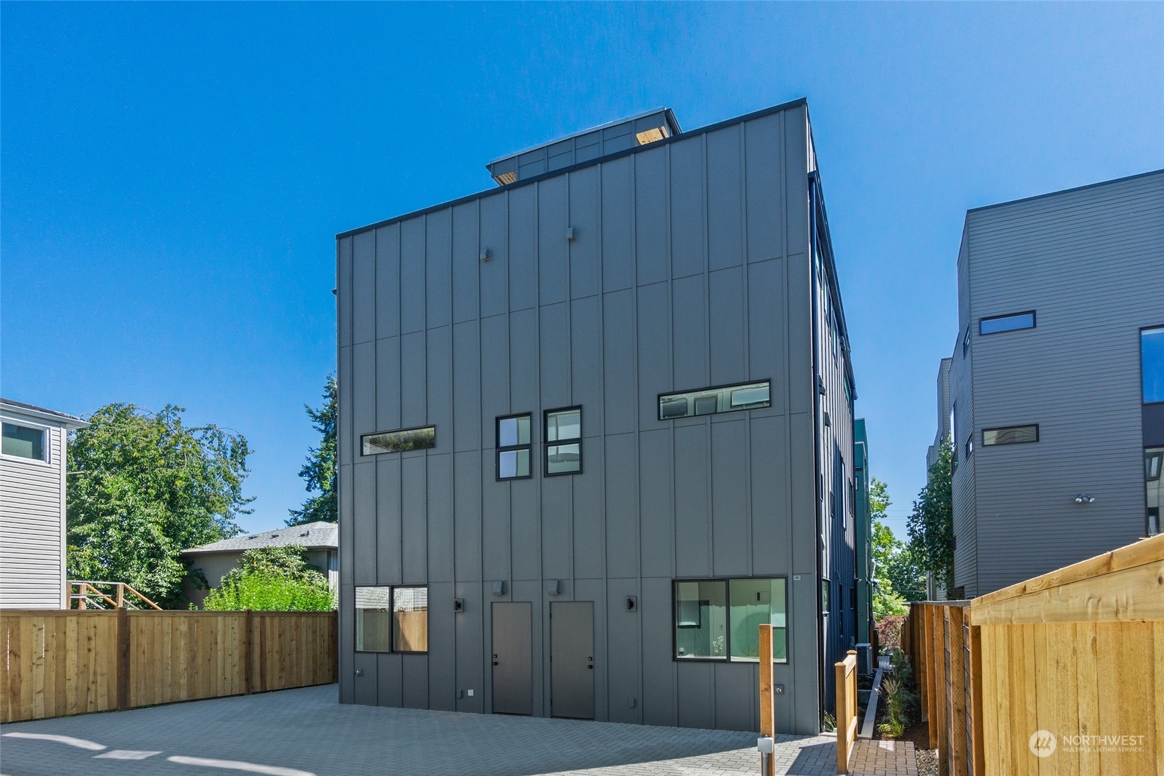 2620 Northwest 62nd Street, Unit B Seattle, WA 98107 - Photo 34 of 34 a view of a house with a garage