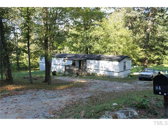 120 Canyon Road Clayton, NC 27520 - Photo 1 of 8 Tucked away on the side of a private road, this home sits in a quite little canyon road!