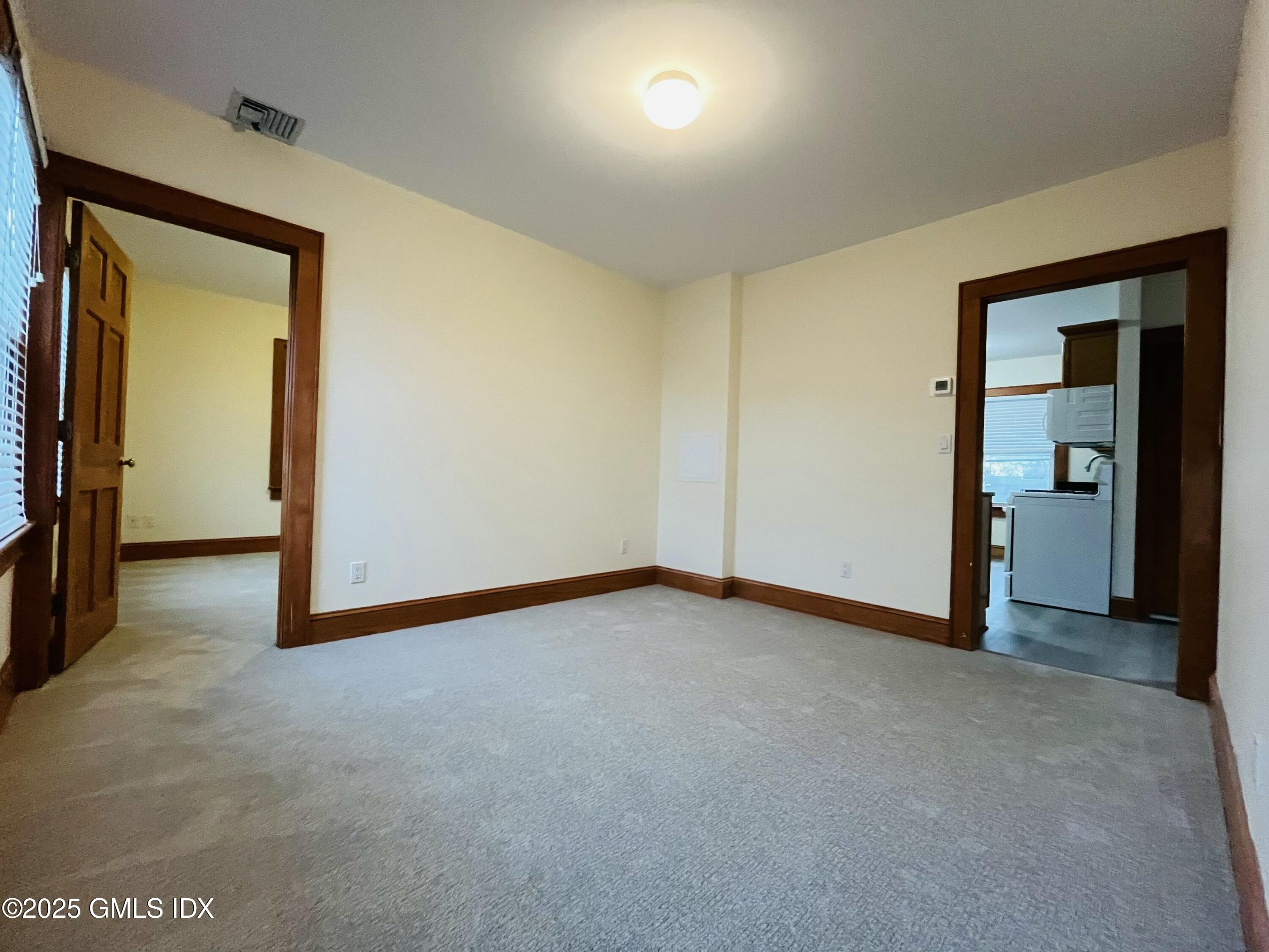 18 Grand Street, Unit 2 Greenwich, CT 06830 - Photo 5 of 10 a view of an empty room