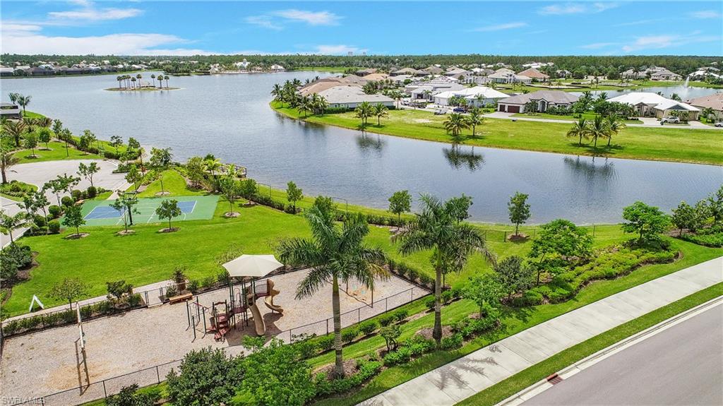 14899 Edgewater Circle Naples, FL 34114 - Photo 32 of 33 an aerial view of a house with a lake view