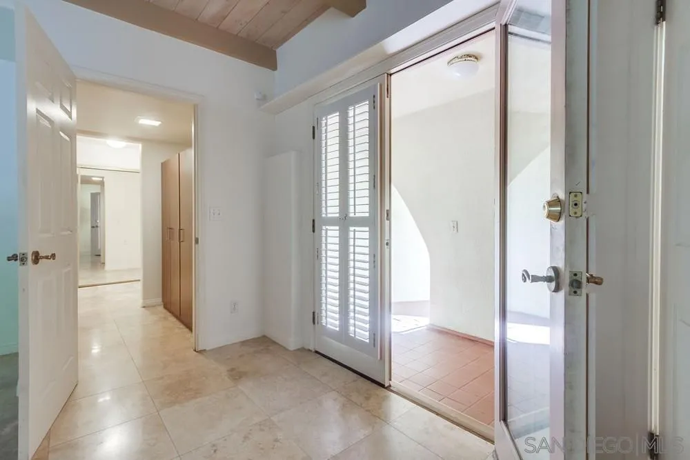 1145 La Jolla Rancho Road La Jolla, CA 92037 - Photo 33 of 45 a view of entryway with bathroom and glass door