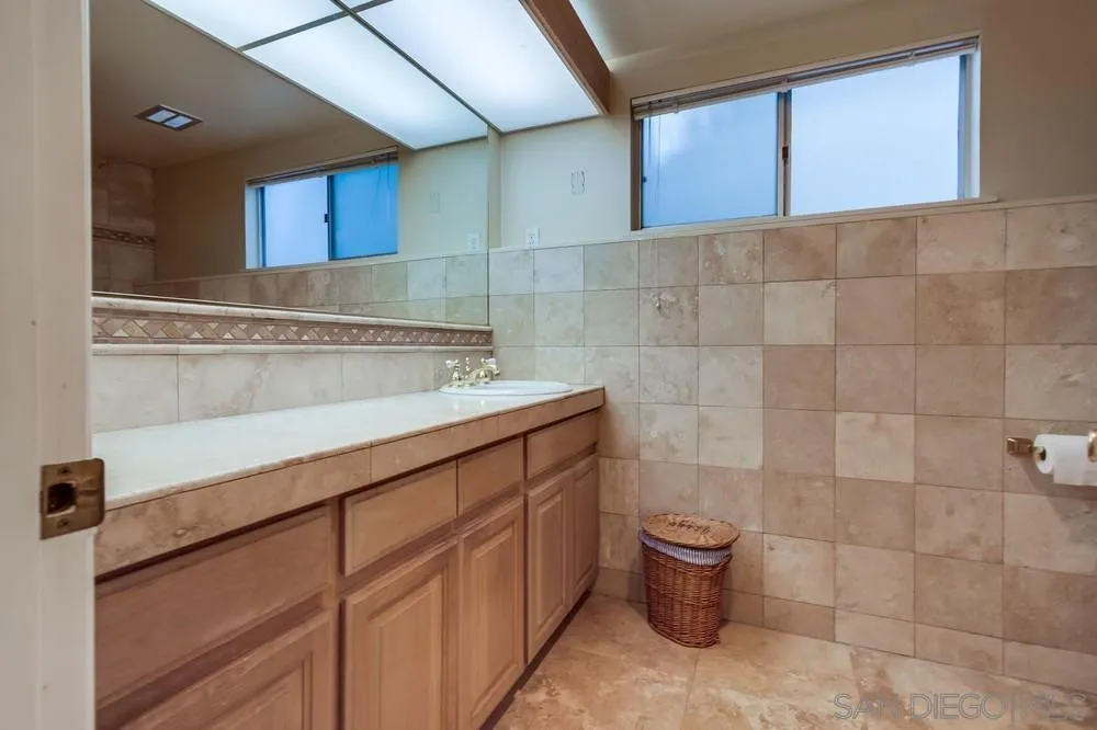 1145 La Jolla Rancho Road La Jolla, CA 92037 - Photo 35 of 45 a bathroom with a sink and a toilet