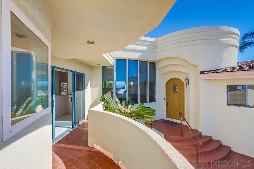 1145 La Jolla Rancho Road La Jolla, CA 92037 - Photo 39 of 45 a potted plant sitting in front of a house