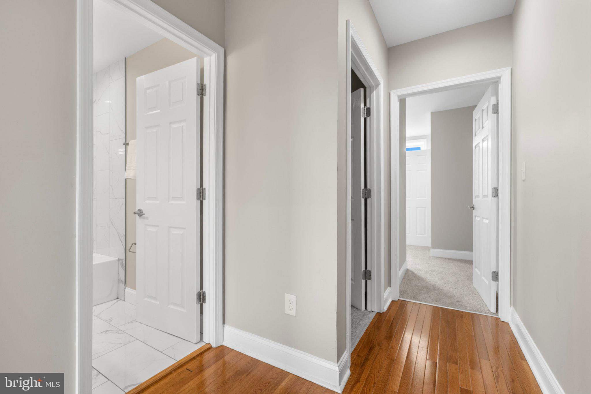 145 North Monastery Avenue Baltimore, MD 21229 - Photo 12 of 45 Inviting hallway with modern finishes.