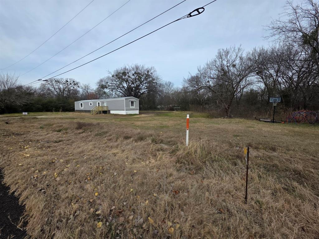 1201 South Patterson Campbell, TX 75422 - Photo 2 of 7 a view of dirt yard