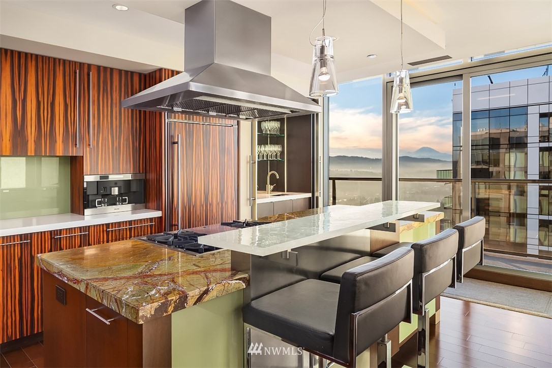 650 Bellevue Way Northeast, Unit 4102 Bellevue, WA 98004 - Photo 6 of 25 a dining table with chairs and window