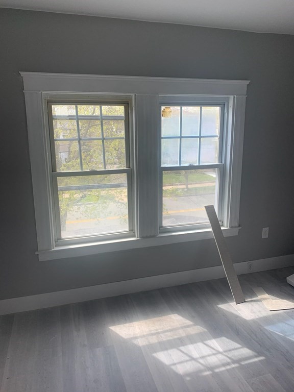 999 Rodman Street Fall River, MA 02721 - Photo 3 of 4 a view of an empty room with a window