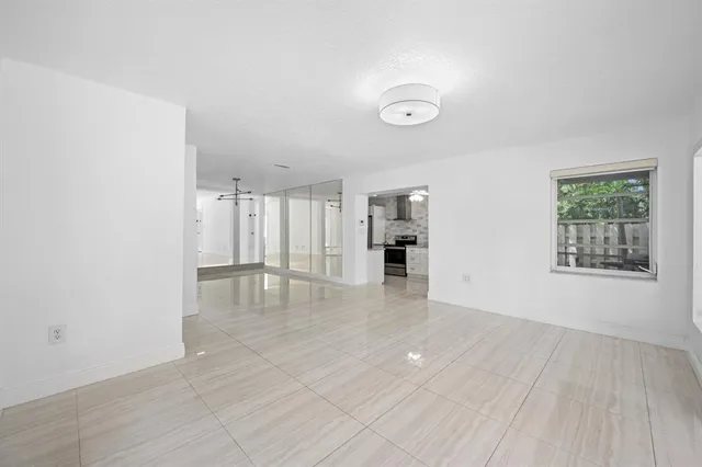 a view of a living room and livingroom with furniture