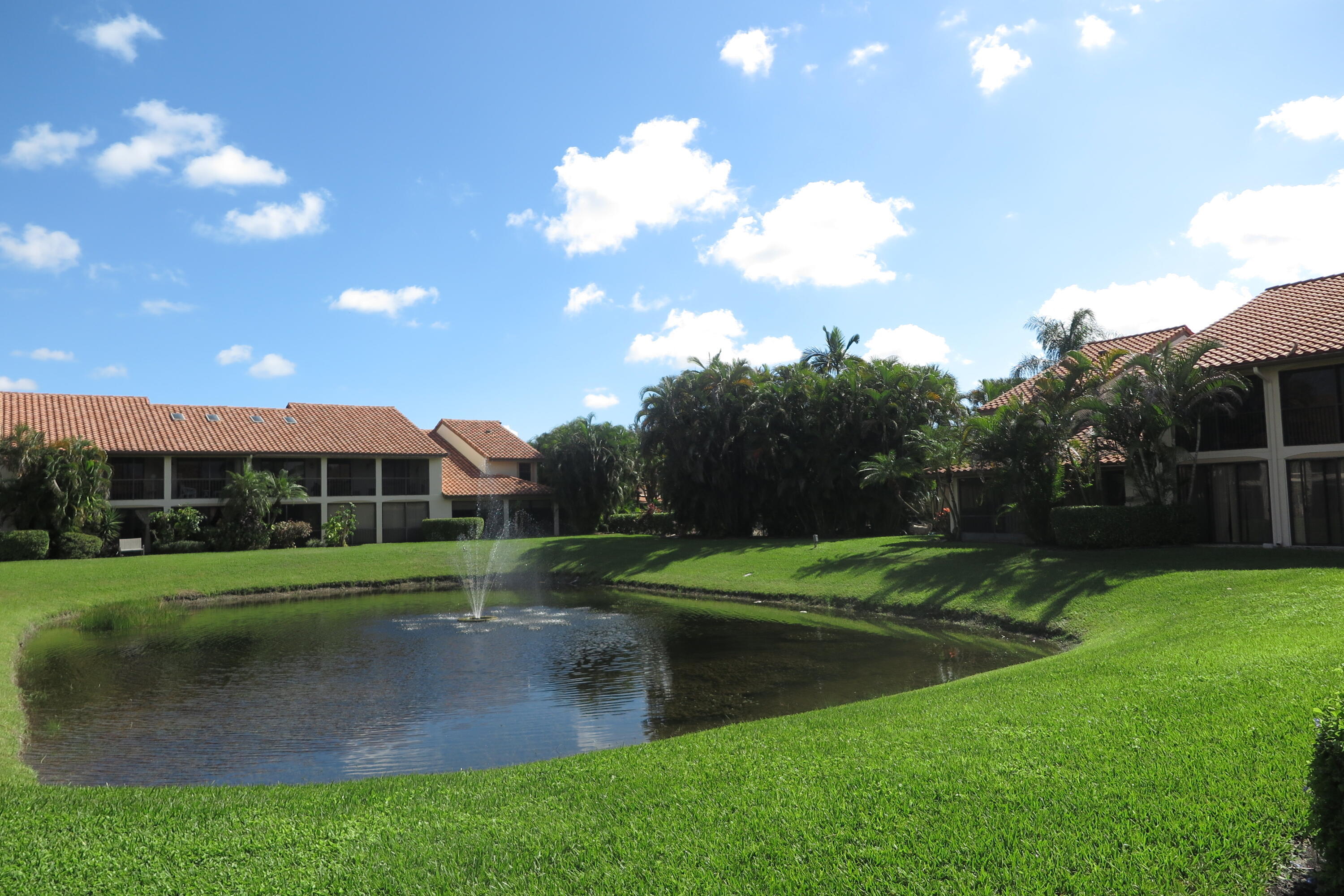 7875 La Mirada Drive Boca Raton, FL 33433 - Photo 24 of 31 a view of a golf course with a lake