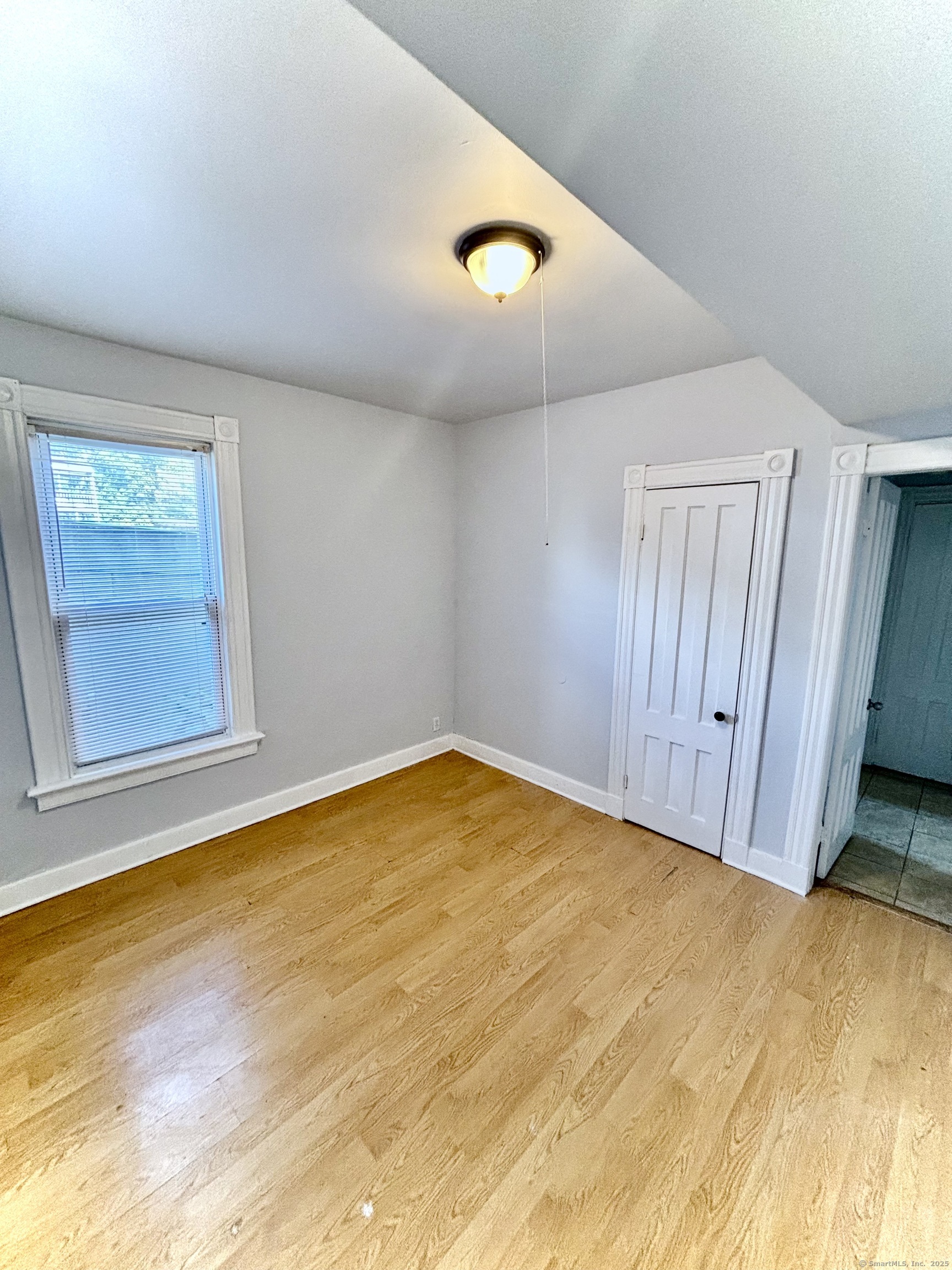 57 Houston Street, Unit 1 New Haven, CT 06513 - Photo 3 of 11 a view of an empty room and window
