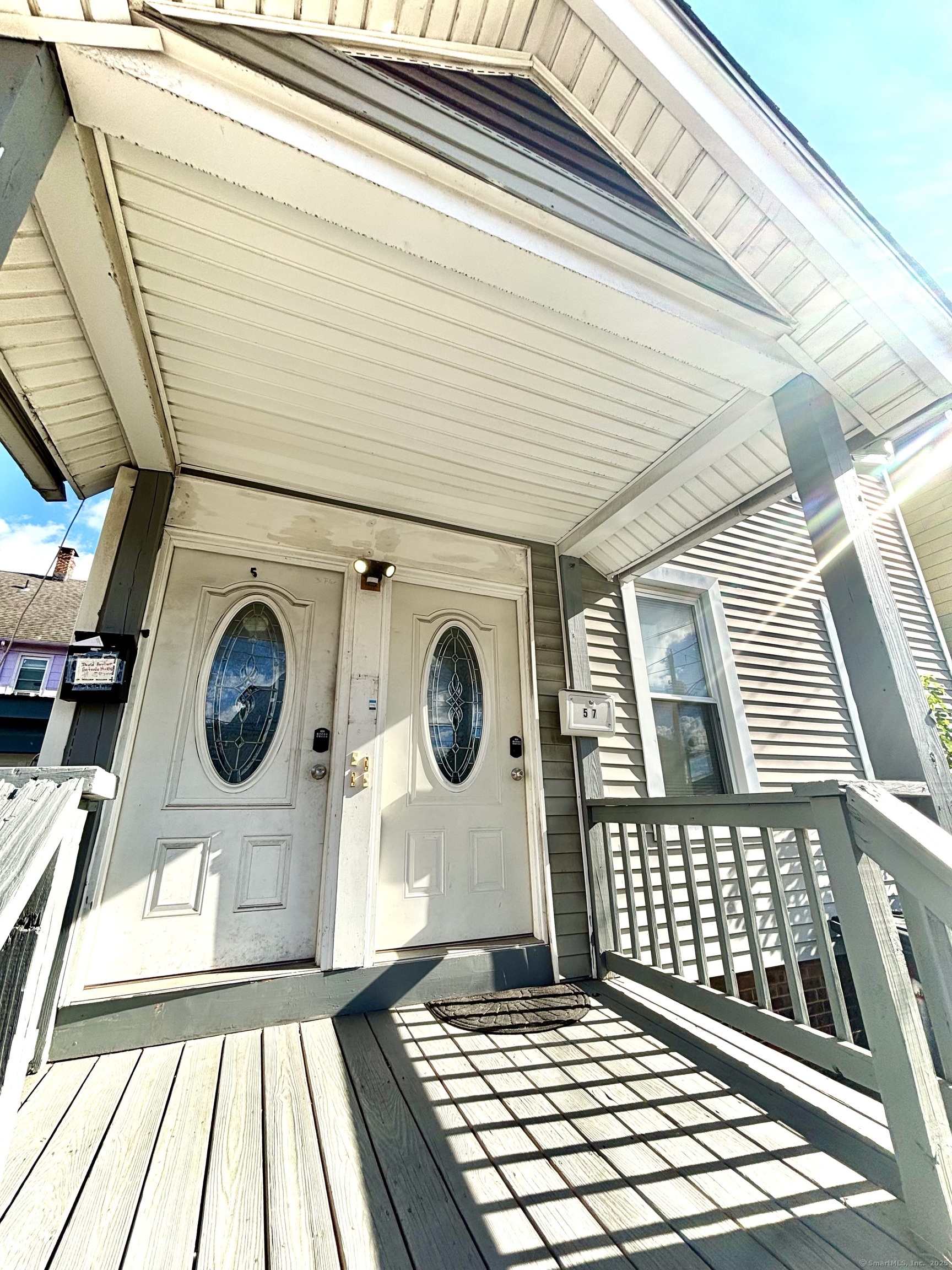 57 Houston Street, Unit 1 New Haven, CT 06513 - Photo 9 of 11 a view of a wooden chairs with a door