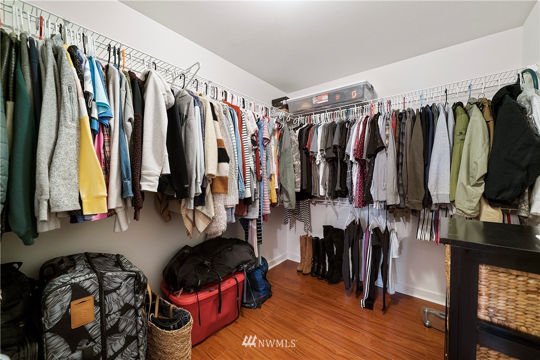 14817 South Tilley Road Tenino, WA 98589 - Photo 20 of 38 a walk in closet with clothes and shoes
