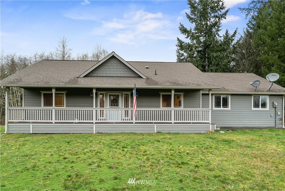 14817 South Tilley Road Tenino, WA 98589 - Photo 30 of 38 a front view of a house with a garden