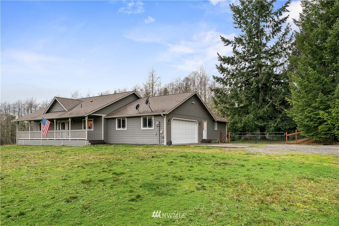 14817 South Tilley Road Tenino, WA 98589 - Photo 35 of 38 a front view of a house with a yard