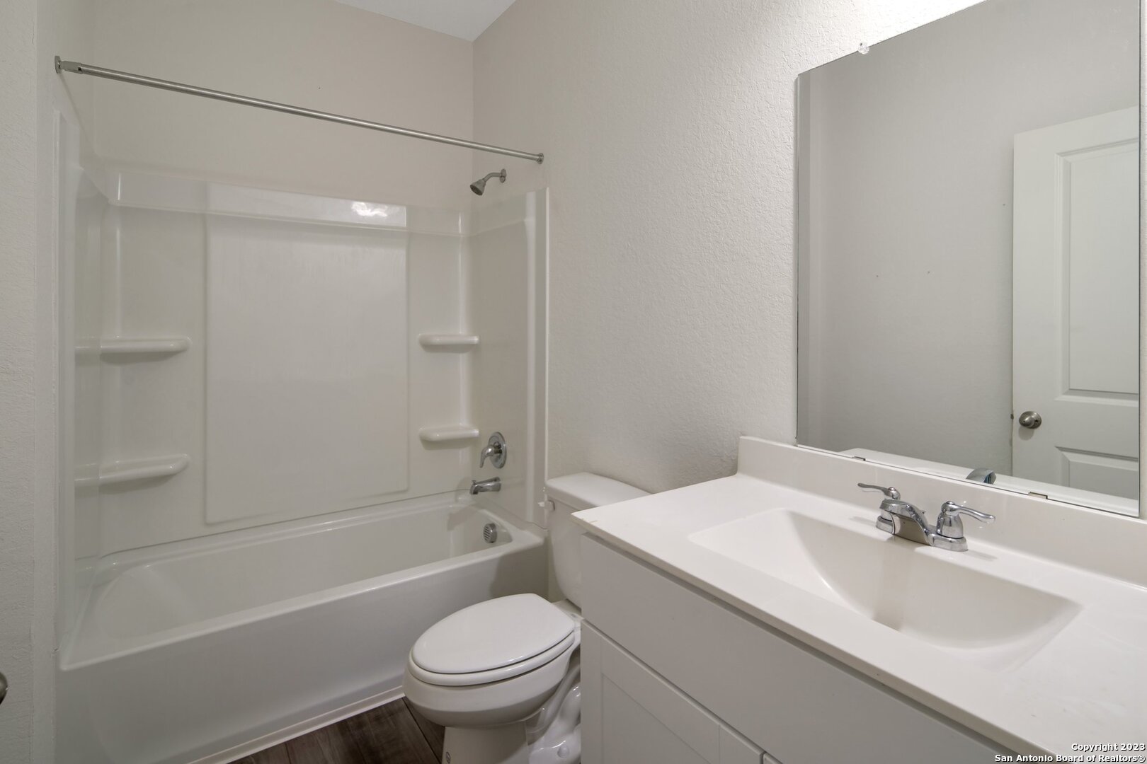 5246 Winding Streme St. Hedwig, TX 78152 - Photo 11 of 25 a bathroom with a sink toilet and shower