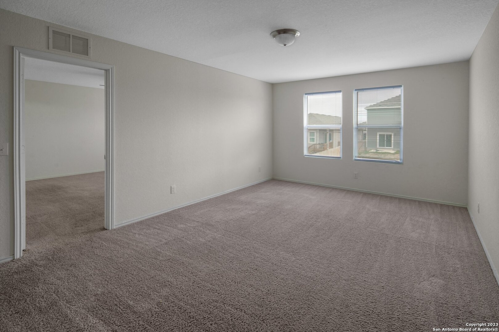 5246 Winding Streme St. Hedwig, TX 78152 - Photo 12 of 25 a view of an empty room with a window
