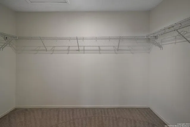 a view of a room with racks on the wall