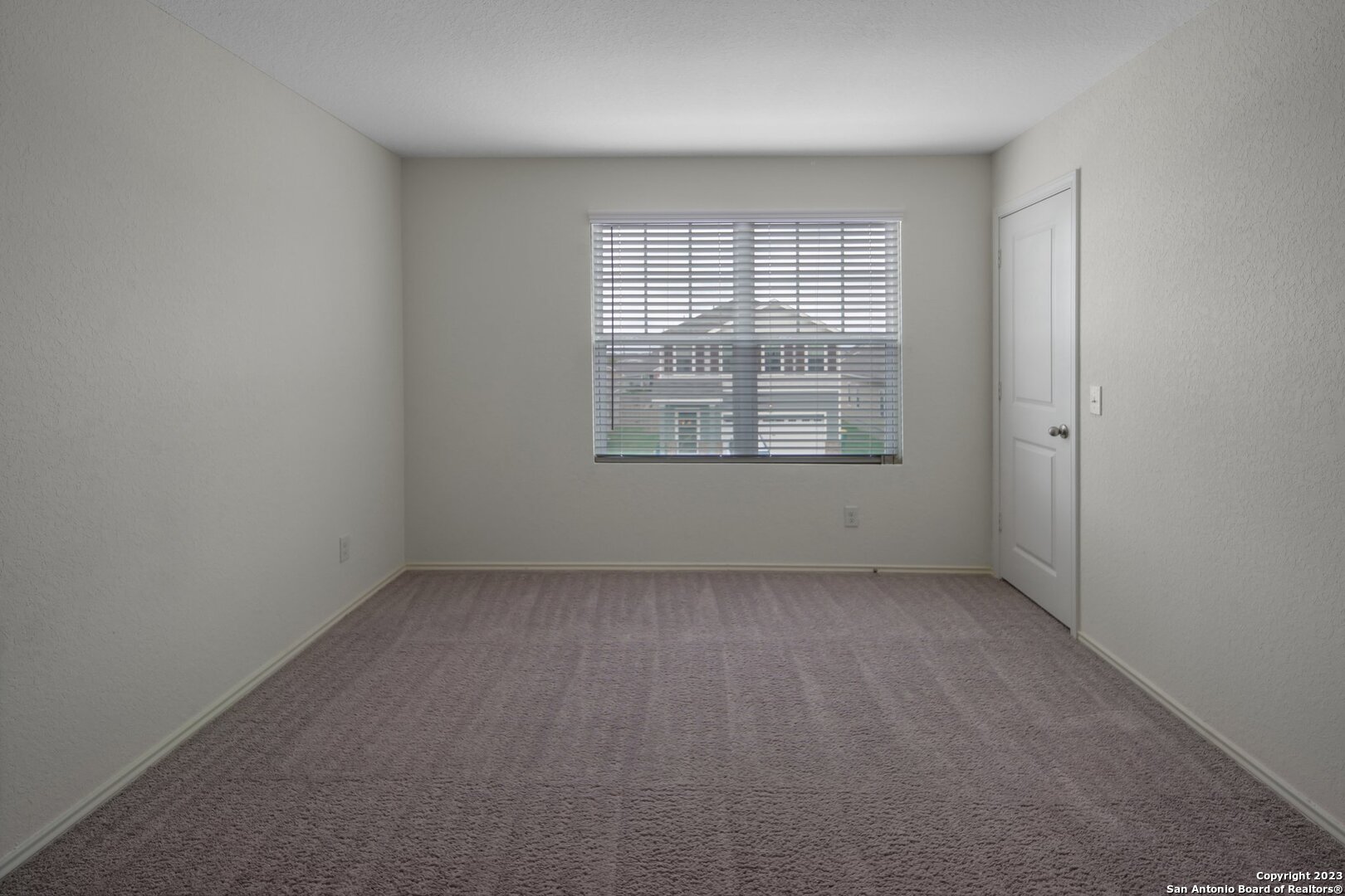 5246 Winding Streme St. Hedwig, TX 78152 - Photo 21 of 25 an empty room with a window