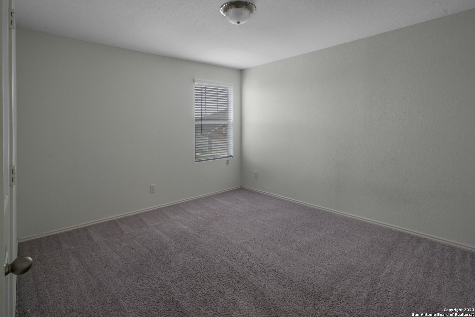 5246 Winding Streme St. Hedwig, TX 78152 - Photo 23 of 25 an empty room with windows