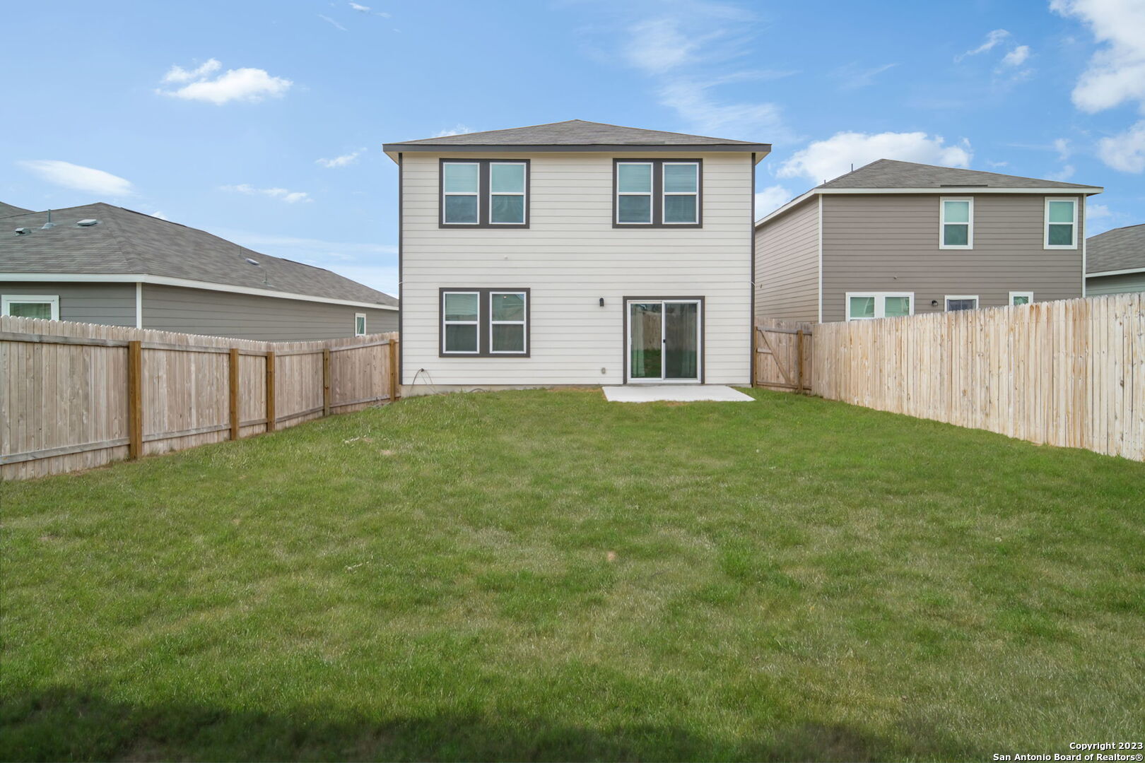 5246 Winding Streme St. Hedwig, TX 78152 - Photo 25 of 25 a front view of a house with a yard