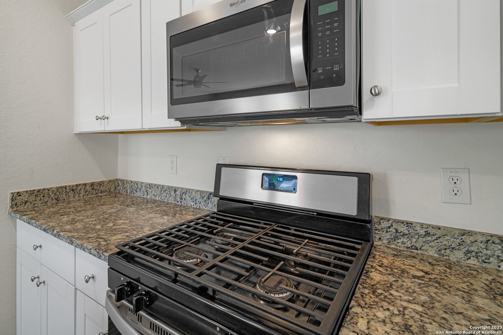 5246 Winding Streme St. Hedwig, TX 78152 - Photo 8 of 25 a stove top oven sitting inside of a kitchen