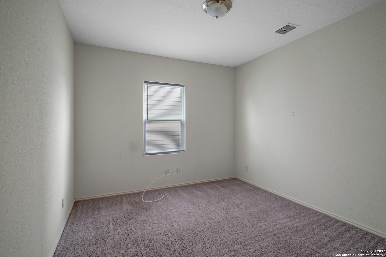 5246 Winding Streme St. Hedwig, TX 78152 - Photo 10 of 25 an empty room with a window