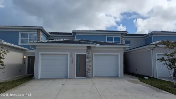 a view of a house with garage