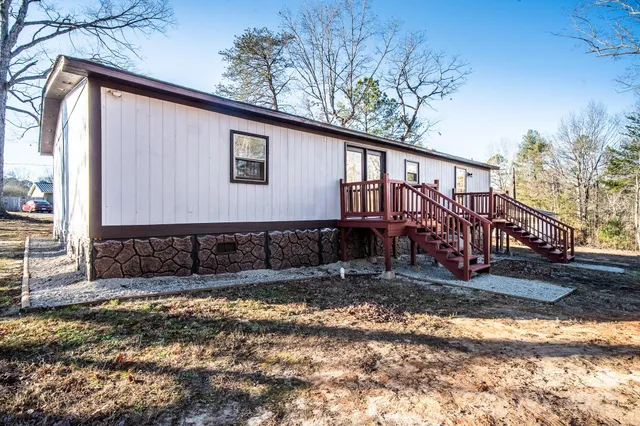 a view of swimming pool with a yard