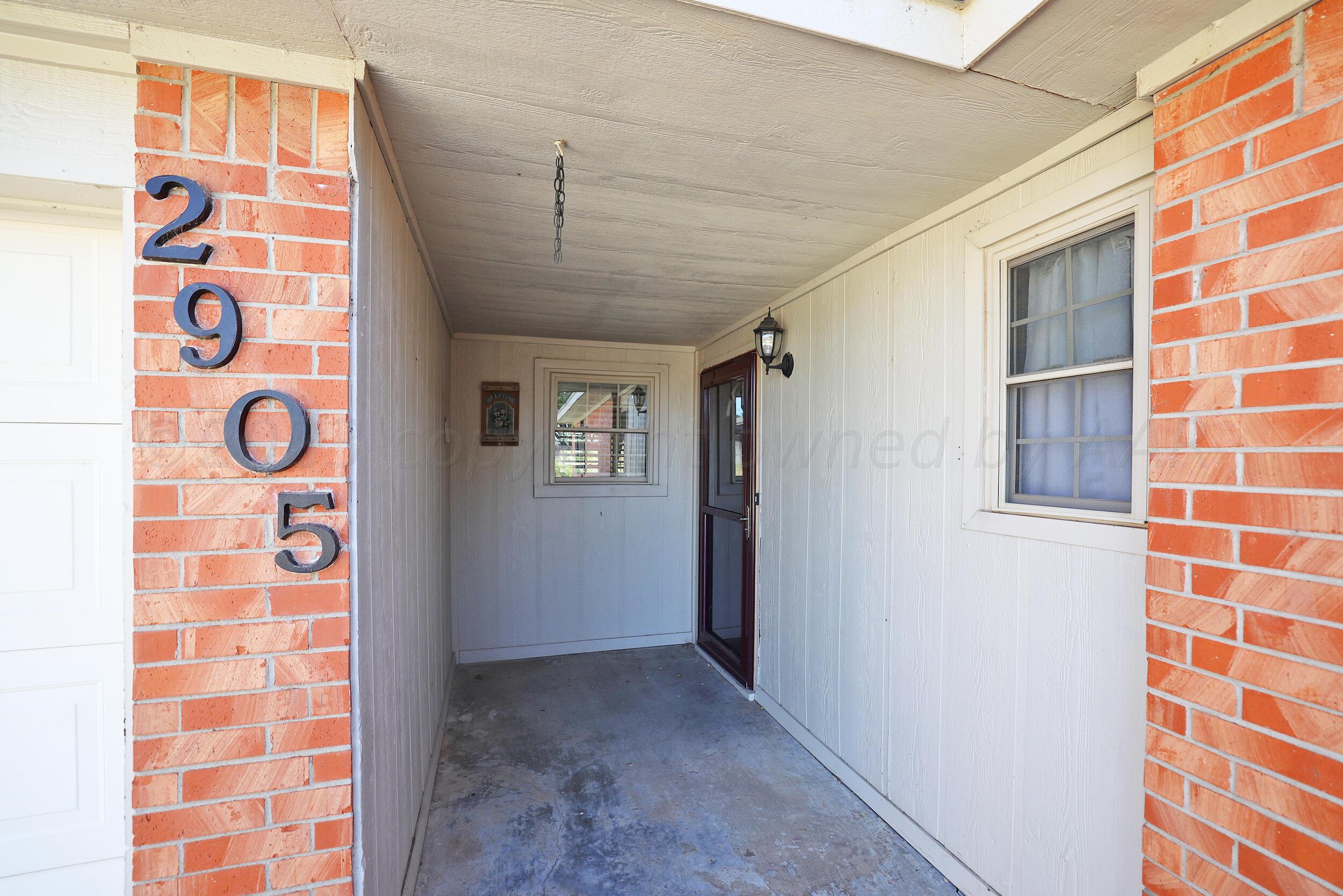 2905 Salem Drive Amarillo, TX 79110 - Photo 3 of 29 a view of an entryway with a door