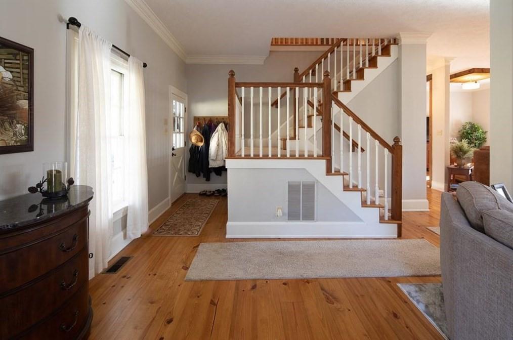 1249 Little Mountain Road Dawsonville, GA 30534 - Photo 11 of 40 a view of entryway and hall with wooden floor