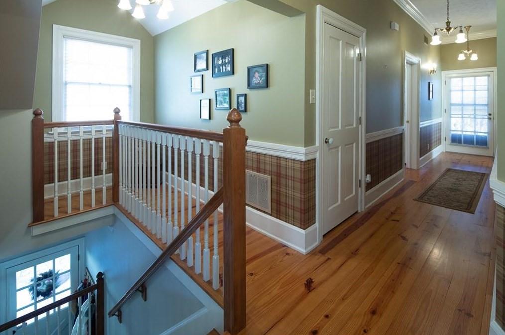 1249 Little Mountain Road Dawsonville, GA 30534 - Photo 12 of 40 a view of a hallway with windows and stairs