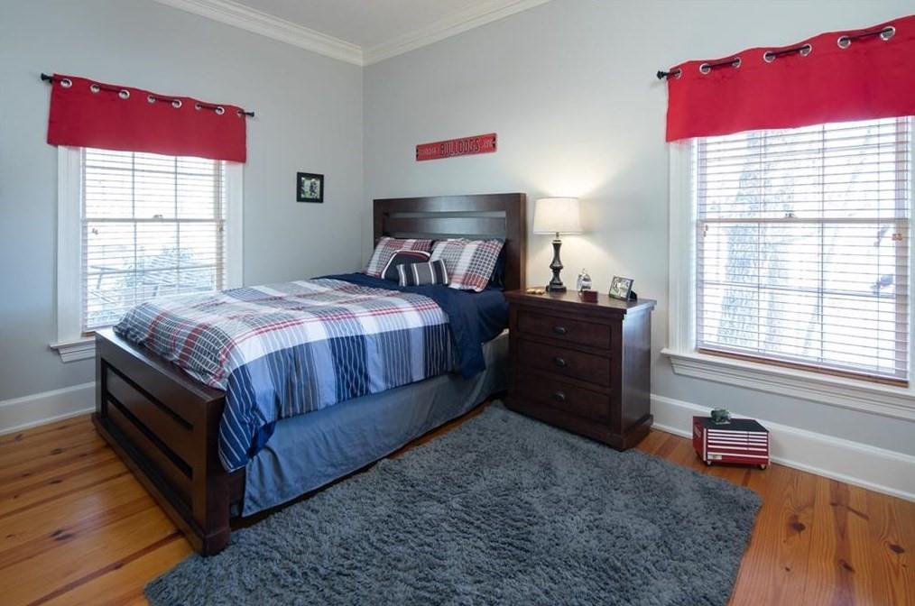 1249 Little Mountain Road Dawsonville, GA 30534 - Photo 19 of 40 a bedroom with a bed and window