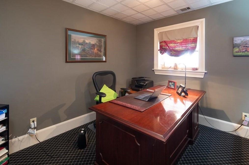 1249 Little Mountain Road Dawsonville, GA 30534 - Photo 23 of 40 a room with furniture and wall paintings