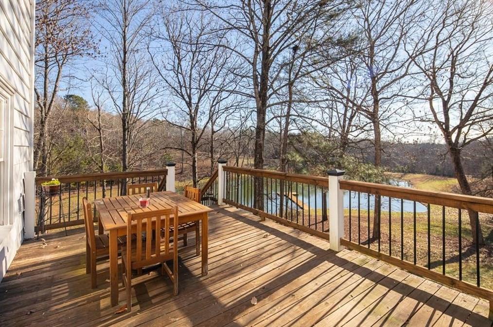 1249 Little Mountain Road Dawsonville, GA 30534 - Photo 24 of 40 a view of a two chairs on the roof deck