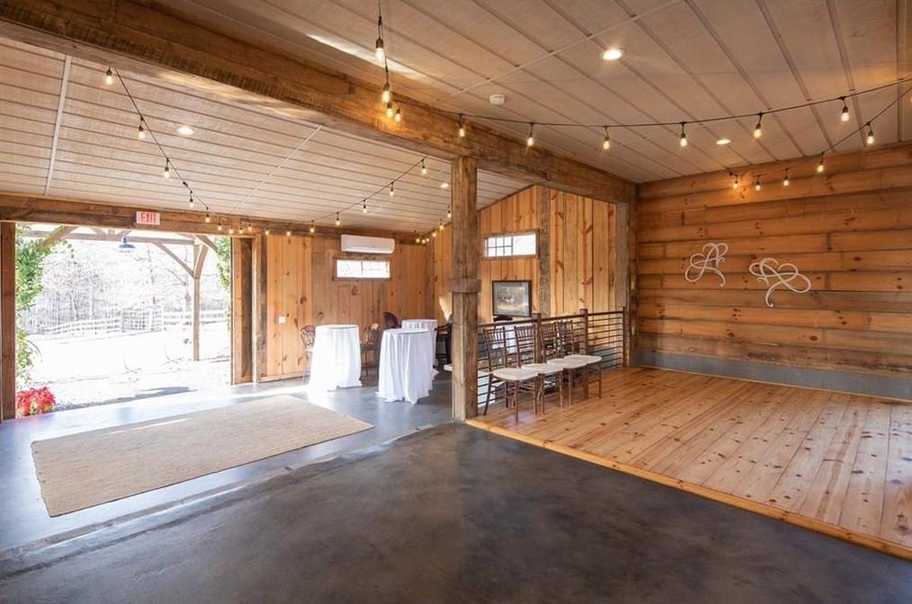 1249 Little Mountain Road Dawsonville, GA 30534 - Photo 30 of 40 a view of an empty room with a fireplace