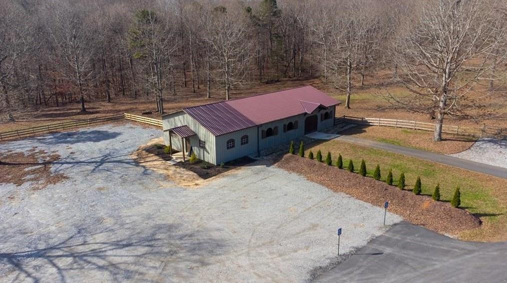 1249 Little Mountain Road Dawsonville, GA 30534 - Photo 36 of 40 a view of a backyard with sitting area
