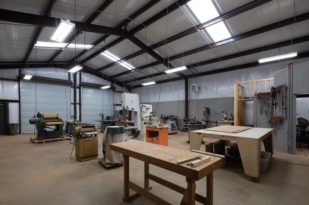 1249 Little Mountain Road Dawsonville, GA 30534 - Photo 40 of 40 a view of a kitchen with a sink a counter and chairs
