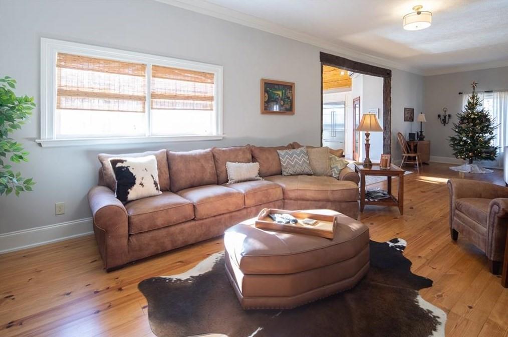 1249 Little Mountain Road Dawsonville, GA 30534 - Photo 9 of 40 a living room with furniture and a large window