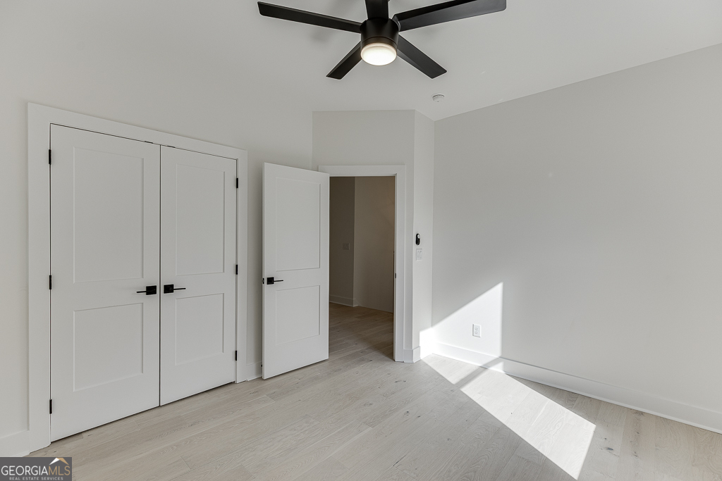 5422 Copper Crk Road Flowery Branch, GA 30542 - Photo 31 of 57 a view of an empty room and window