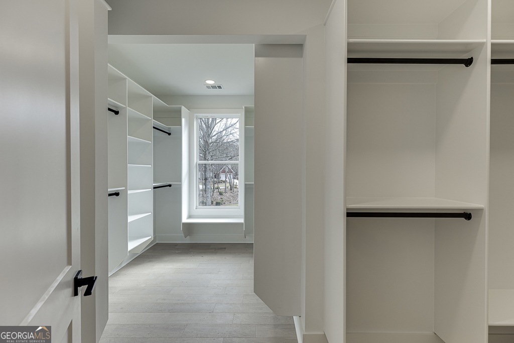 5422 Copper Crk Road Flowery Branch, GA 30542 - Photo 45 of 57 a view of an empty room with a window