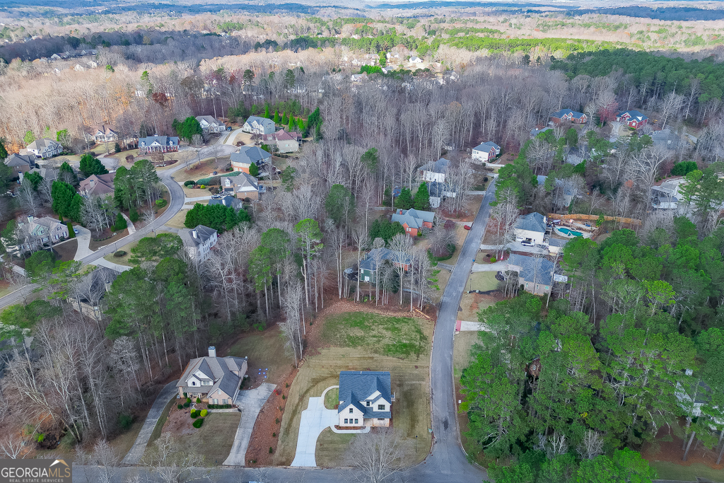 5422 Copper Crk Road Flowery Branch, GA 30542 - Photo 57 of 57 an aerial view of residential house with outdoor space