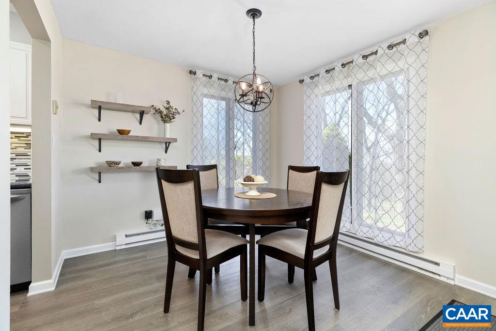 2070 Stone Ridge Wintergreen, VA 22967 - Photo 14 of 52 a view of a dining room with furniture window and wooden floor