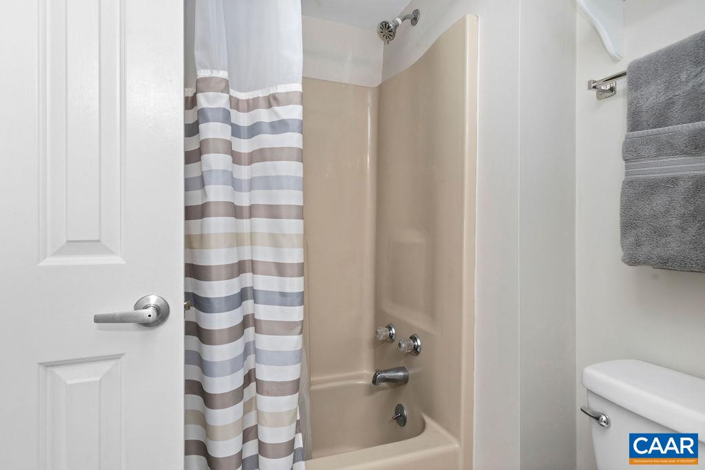 2070 Stone Ridge Wintergreen, VA 22967 - Photo 20 of 52 a bathroom with a bathtub and shower